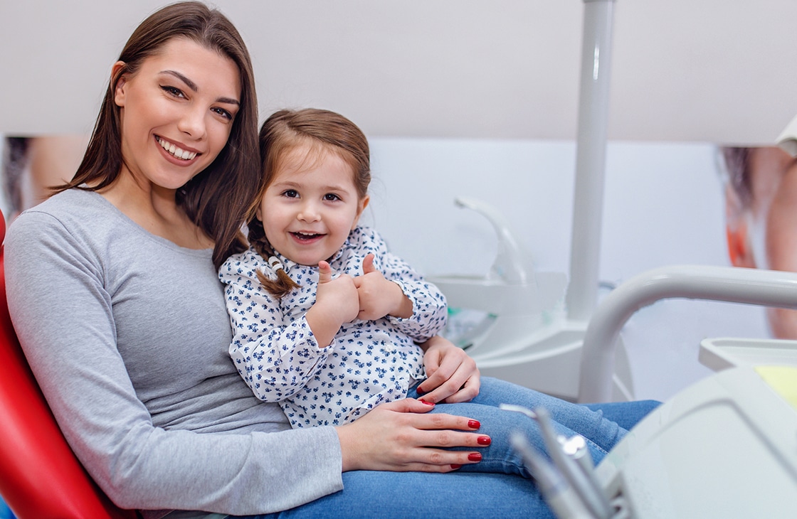 Mother and Child In Dental Chair Photo